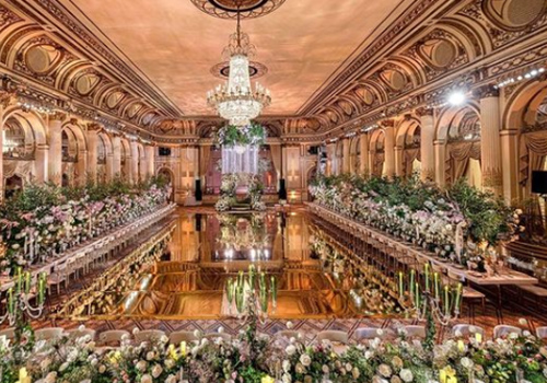 large reflective dance floor in ballroom wedding venue